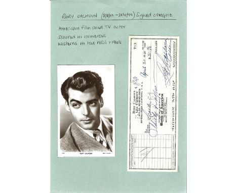 Roy Calhoun signed personal cheque, attached to page with corner tabs. America film and tv actor. Good condition. All autogra