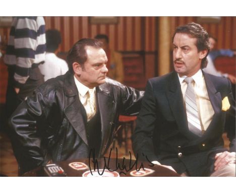 John Challis signed 12x8 colour photograph pictured during his time playing Boyce during the hit British comedy drama, Only F