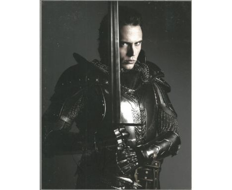 Sam Claflin signed10x8 colour photo. Claflin gained wider recognition for playing Finnick Odair in The Hunger Games film seri