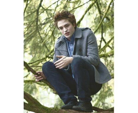 Robert Pattinson signed 10x8 colour photograph taken during his time playing Edward in the Twilight Saga films. Good conditio