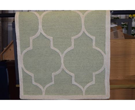 Dulaney hand tufted wool light green rug