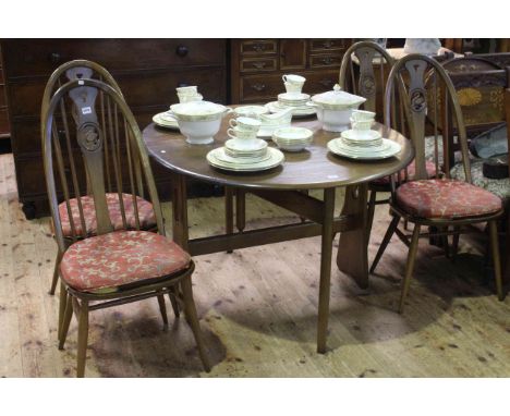 Ercol drop leaf dining table and four swan back dining chairs