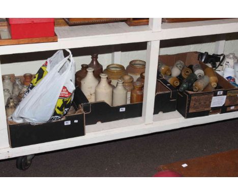 Three boxes of vintage stone and glass bottles, stoneware storage jars, badges, etc