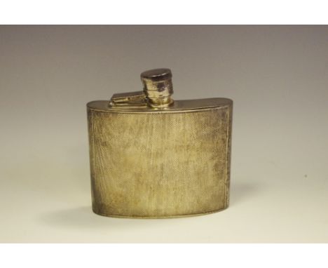 A silver curved rectangular hip flask, engine turned, Birmingham 1942, approx. 168g 