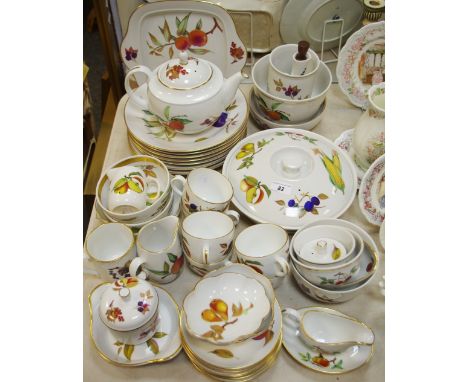 A Royal Worcester Evesham pattern dinner and tea service for six, including teapot, milk and sugar, vegetable dish and cover,