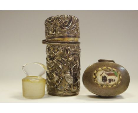 A Victorian silver smelling salt bottle; a silver trinket box