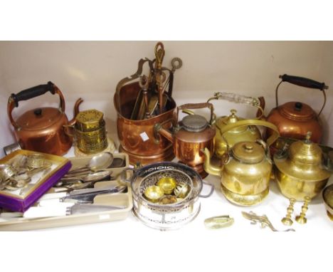 A copper kettle; another; a brass tea kettle; copper oil lamp; EPNS and other flatware; napkin rings; decorative brassware; a