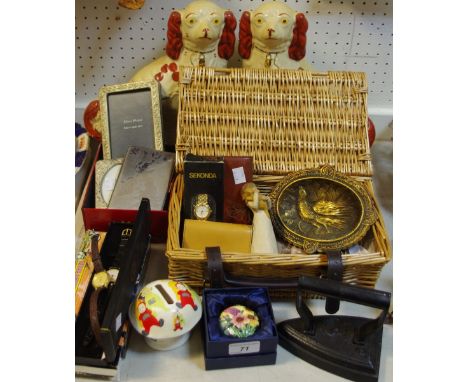 A pair of Staffordshire mantel dogs; fashion watches; a Teletubbies coin bank; a Quadband Pocketsurfer 2 internet device; poc