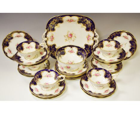 A part Coalport tea setting for six, c.1910; a Victorian flow blue Spode Trophy pattern part dinner service