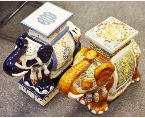 A ceramic elephant stool in tones of brown and green; another, elephant stool in tones of blue and white