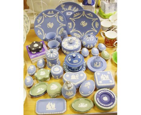 A Wedgwood Jasperware trinket pot and cover, powder bowl, eggs, salt and pepper, plates, trinket dishes, tobacco jar and cove