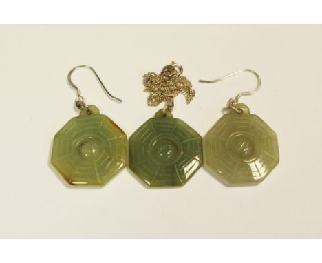 A jade pendant and earring set