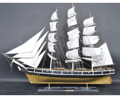 A vintage retro 20th century Scratch built&nbsp;wooden kit model of Cutty Sark&nbsp;sailing ship having white sail, white pai