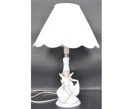 A ceramic porcelain Spanish Lladro table lamp the group composition being entitled 'The Enchanted Forest'. Figurine model num