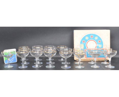 A collection of vintage retro 1960’s Babycham glasses. The collection to include: nine Babycham dark blue fonts glasses, ten 