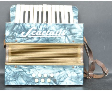 A vintage mid 20th century German made Scarlatti piano accordion having blue mother of pearl style panels with pierced metal 