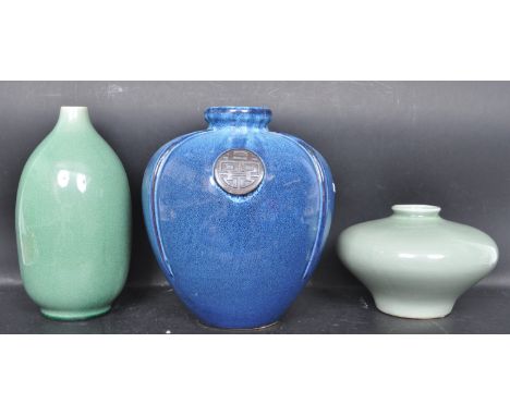 A group of three contemporary Chinese oriental ceramic vases to include a blue mottled glazed vase having a tapering body wit