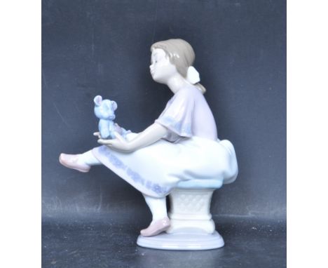 A ceramic porcelain Spanish Lladro figure entitled 'Best Friend'. Figurine model number 7620. Complete with original presenta