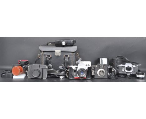 A collection of vintage retro 20th century 35mm cameras and lenses to include Praktica LTL with Meyer-Optik Gorlitz Domiplan 