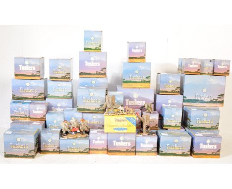 A large collection of vintage retro 20th century Tuskers - Small Elephants In A Big Box collectors figurines to include: Cide