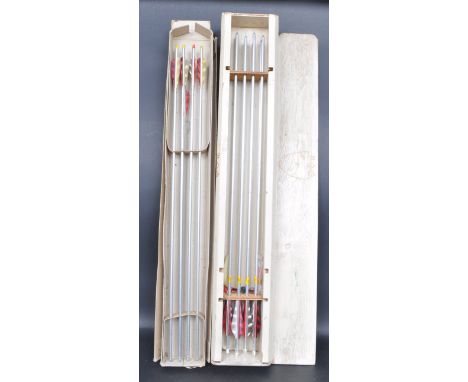 A collection of 12 vintage retro 20th century hand crafted metal arrows. The sportive arrows having aluminium body / shaft wi