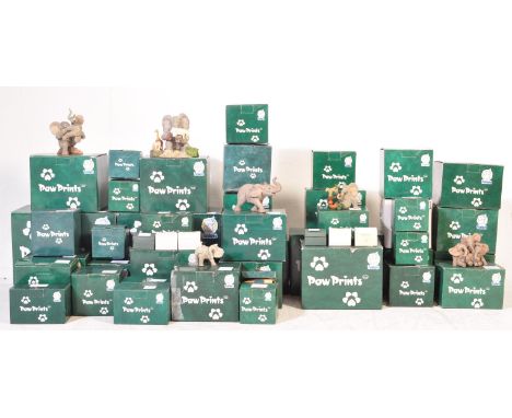 A large collection of vintage retro 20th century Tuskers Paw Prints figurines / collectors figurines to include: Barclay 9031
