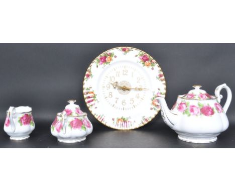 A collection of vintage 20th century Royal Albert china comprising of a tea pot, lidded sugar bowl, gravy boat and more. Coll