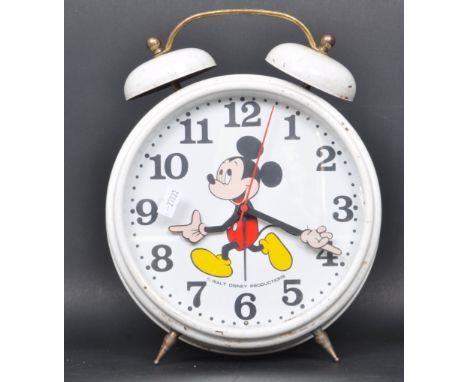 A retro vintage circa 1970s 20th century Mickey Mouse metal alarm clock having arabic numerals to the chapter ring. Marked Wa