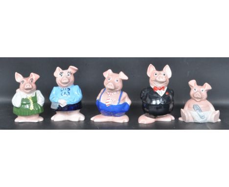 A collection of vintage 20th century Wade Natwest ceramic Pigs / Piggybanks comprising of Father, Mother, Son, Daughter &amp;