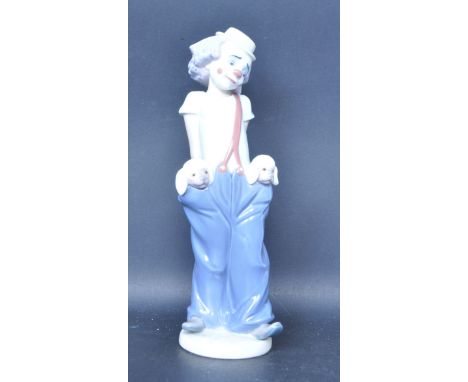 A ceramic porcelain Spanish Lladro Collectors Society figure entitled 'Little Pals'. Figurine model number 7600. Makers marks