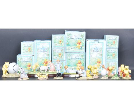 A large collection of vintage 20th century Royal Doulton Winnie the Pooh collection ceramic figurines comprising of Summers D