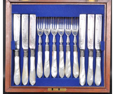 A vintage 20th century six person canteen of silver plate cutlery having engraved blades with mother of pearl style handles. 