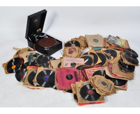 A collection of vintage 20th century audio equipment comprising of a Sharp RD 706 reel to reel player, a HMV turntable togeth