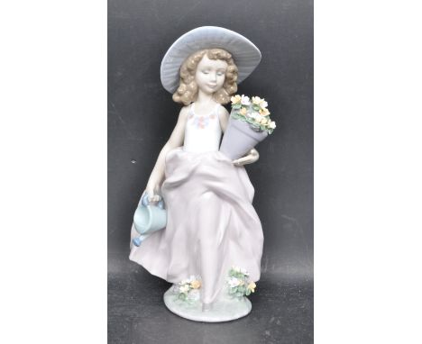 A ceramic porcelain Spanish Lladro Collectors Society 1999 figure entitled 'A Wish Come True'. Figurine model number 7676. Co