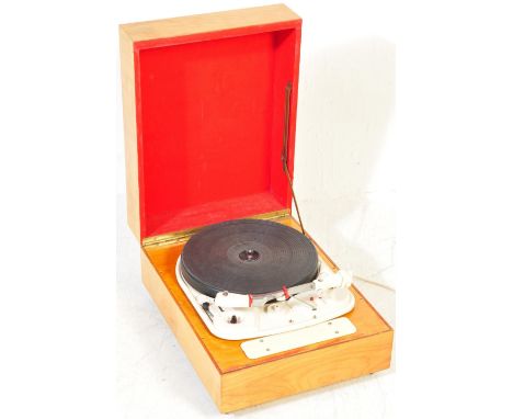 A vintage mid 20th century Garrard Model 4HF turntable. The turntable has a cream colourway and is within a teak case having 