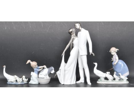 A collection of four ceramic porcelain Spanish figurines by Lladro. The collection comprising of a dancing&nbsp;couple (AF), 