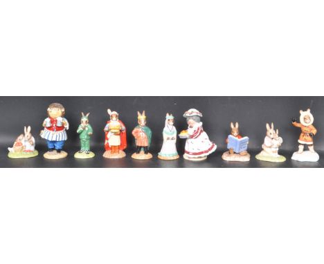 A collection of vintage 20th century ceramic figurines comprising of Strawberry Bunnykins DB277, Maid Marion DB245, Eskimo Bu