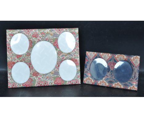 Two vintage 20th century Liberty of London photo frames. The photo frames covered with liberty pattern fabric with circular p