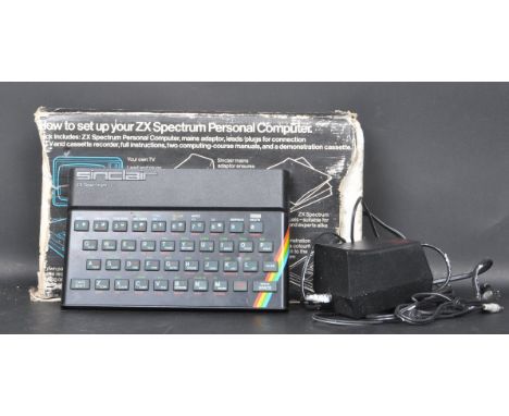 A retro vintage 20th century ZX Spectrum personal computer comprising of keyboard, power pack together with original box.&nbs