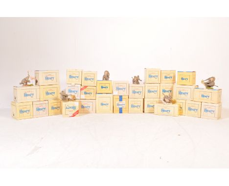 A large collection of vintage retro 20th century Tuskers - The Adventures Of Henry boxed figurines to include: Kiss It Better