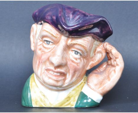 A vintage 20th century Royal Doulton ' Ard of Earing ' toby jug D6594 having a purple tricorn with green and white clothing. 