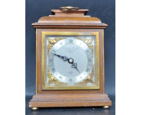 A 20th Century Elliott mantel clock, dial marked Garrard &amp; Co. Ltd., 112 Regent Street, London, having a silvered dial wi