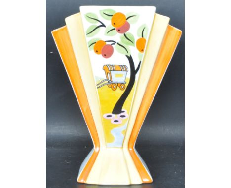 A vintage retro 20th century ceramic porcelain vase by Clarice Cliff in Caravan Sunray pattern. The vase having an Art Deco s