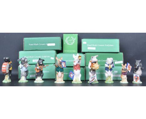 A complete collection of nine vintage 20th century Beswick band figurines comprising of Daniel Violinist Saddleback PigPro 02