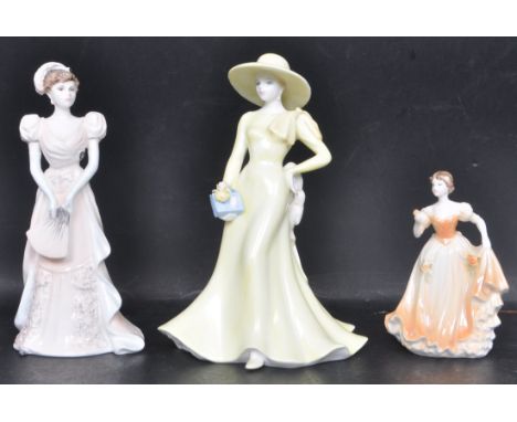 A collection of three vintage 20th century ceramic porcelain ladies figurines by Coalport. the hand decorated figurines depic