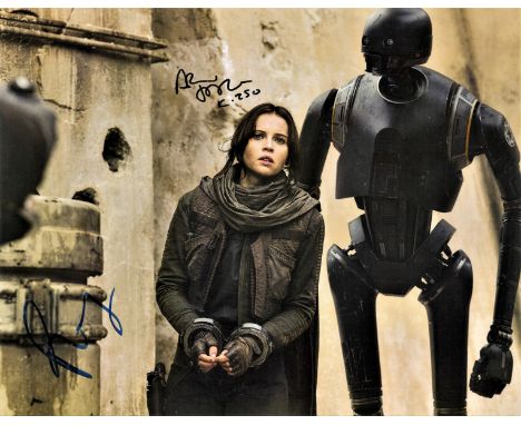 Felicity Jones and Alan Tudyk signed 16x12 colour photograph taken from a scene during the Star Wars film series as they port