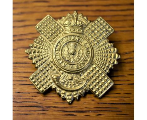 Royal Scots (Lothian Regiment) 4th and 5th Battalions (Queen's Edinburgh Rifles) WWI Economy Cap Badge (Brass), two lugs. K&a
