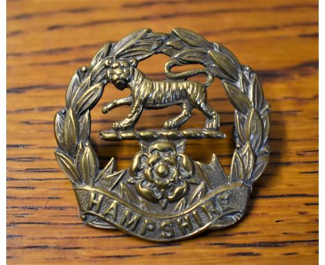 Hampshire Regiment WWI Forage War Economy Cap Badge (Brass), two lugs. K&amp;K: 647