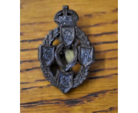 R.E.M.E. WWII Plastic Economy Cap Badge (Tab fitting) Maker marked 'MMM'. K&amp;K: 2271