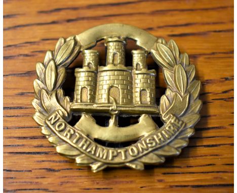Northamptonshire Regiment 4th Battalion WWI Other Ranks Cap Badge (Brass), slider, second type with blank script. K&amp;K: 17